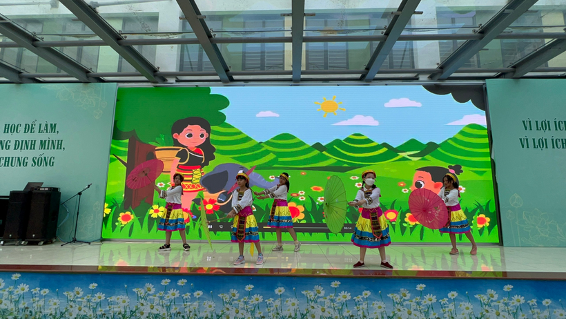 A group of people dancing on a stage

Description automatically generated with medium confidence