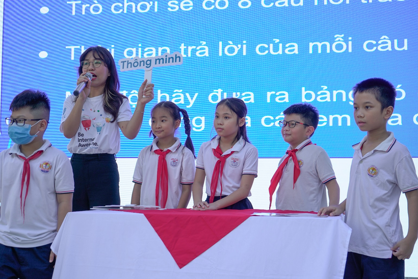 A picture containing text, person, standing

Description automatically generated