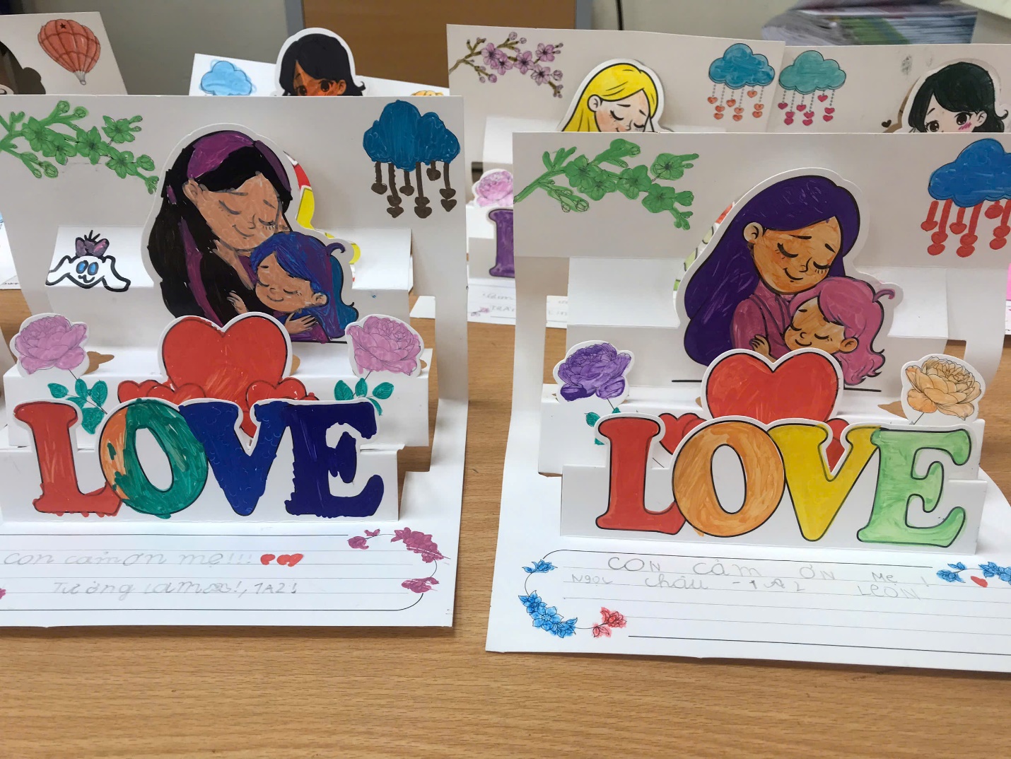 A group of cards with words and imagesDescription automatically generated