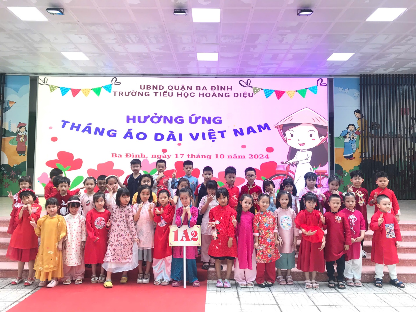 A group of children posing for a photoDescription automatically generated