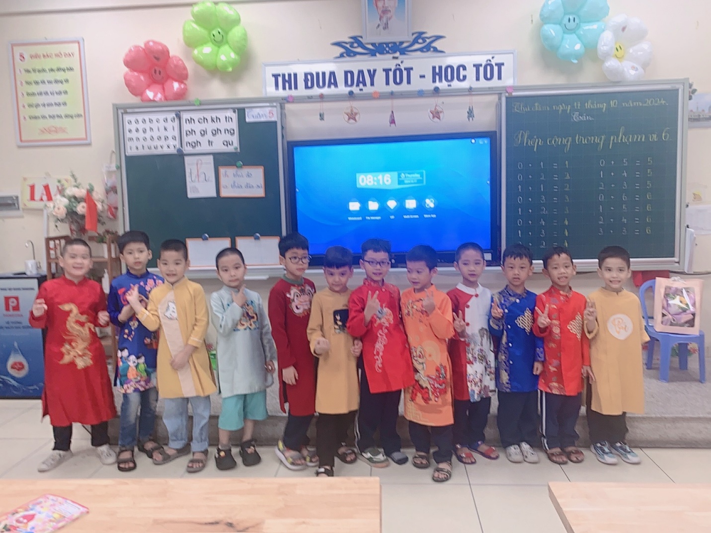 A group of children in a classroomDescription automatically generated