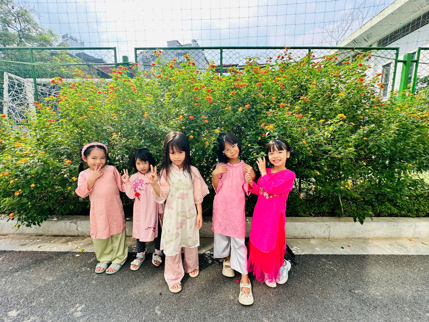 A group of children posing for a pictureDescription automatically generated
