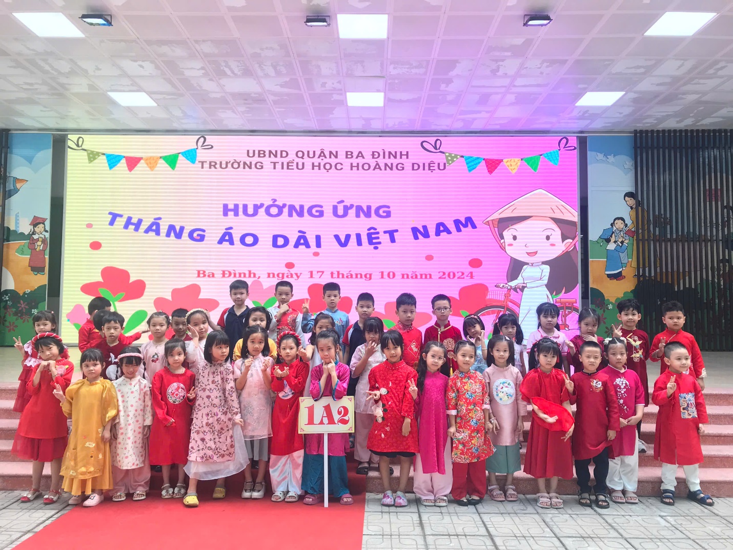 A group of children posing for a photoDescription automatically generated
