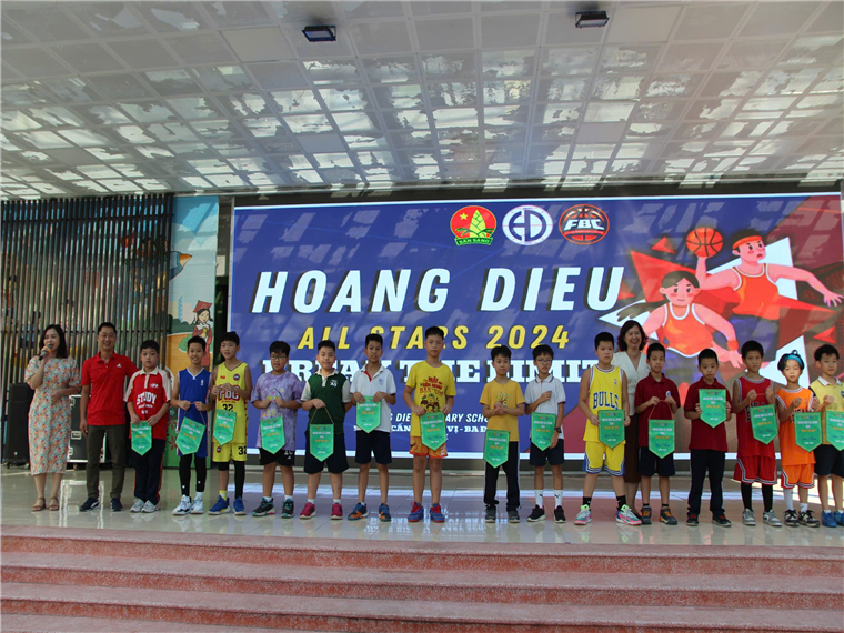 A group of children posing for a photoDescription automatically generated