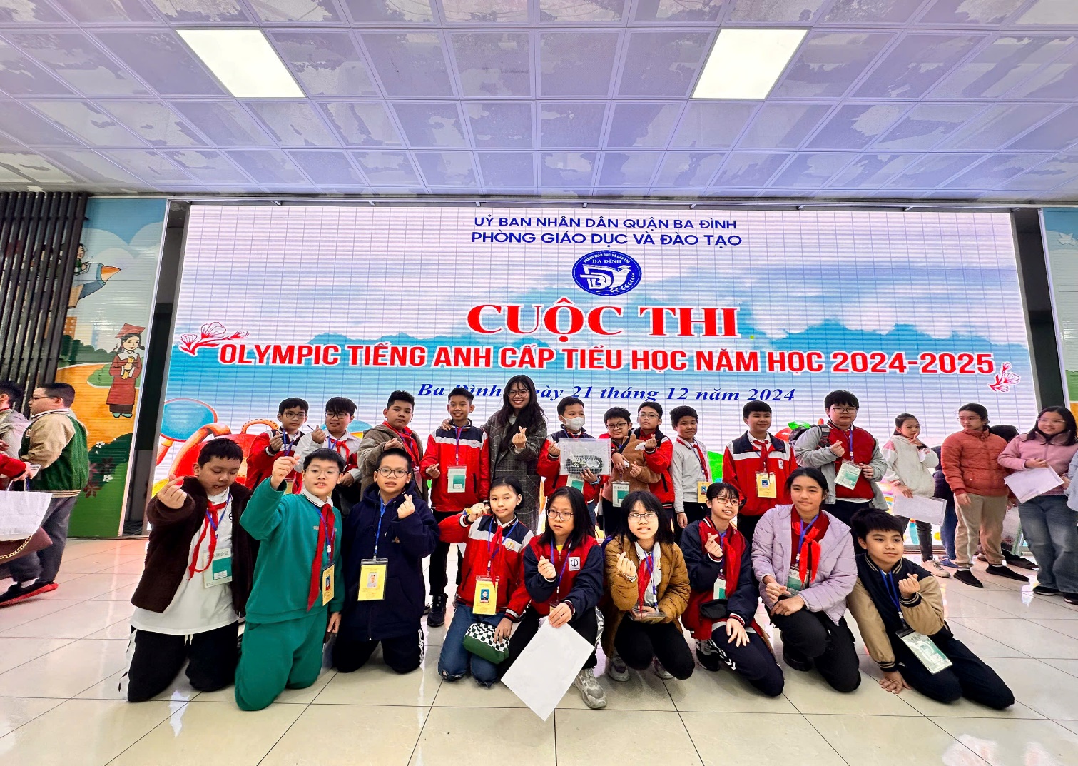 A group of people posing for a photo

Description automatically generated