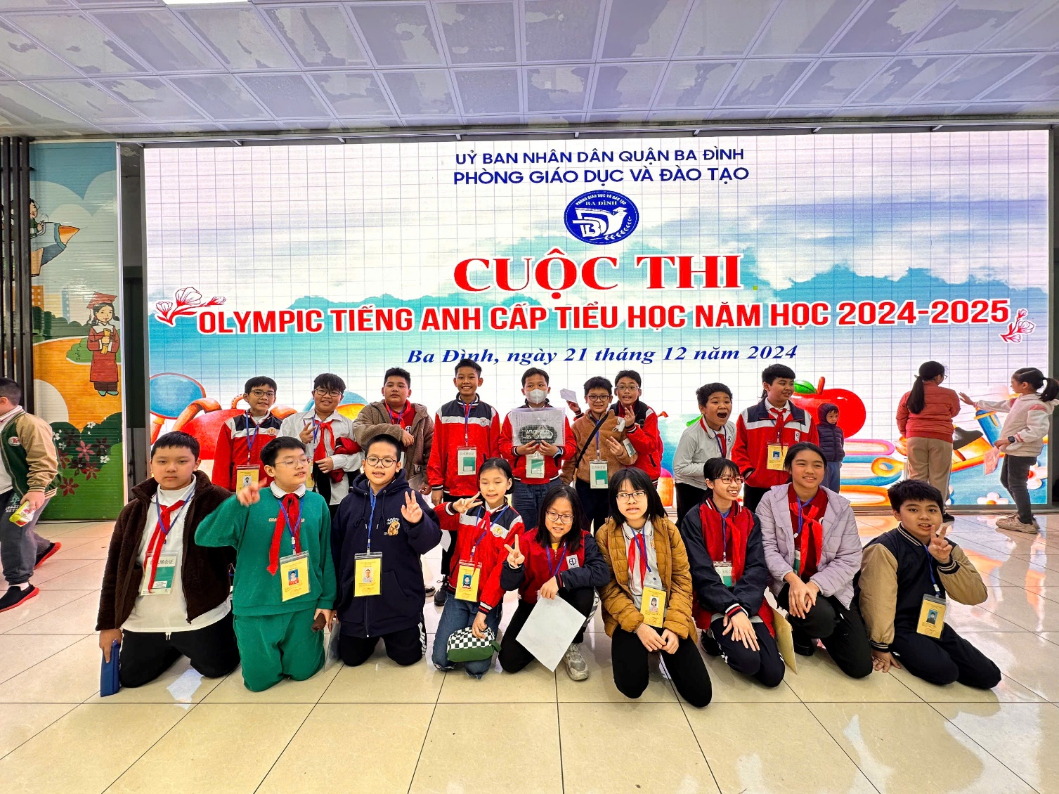 A group of people posing for a photo

Description automatically generated