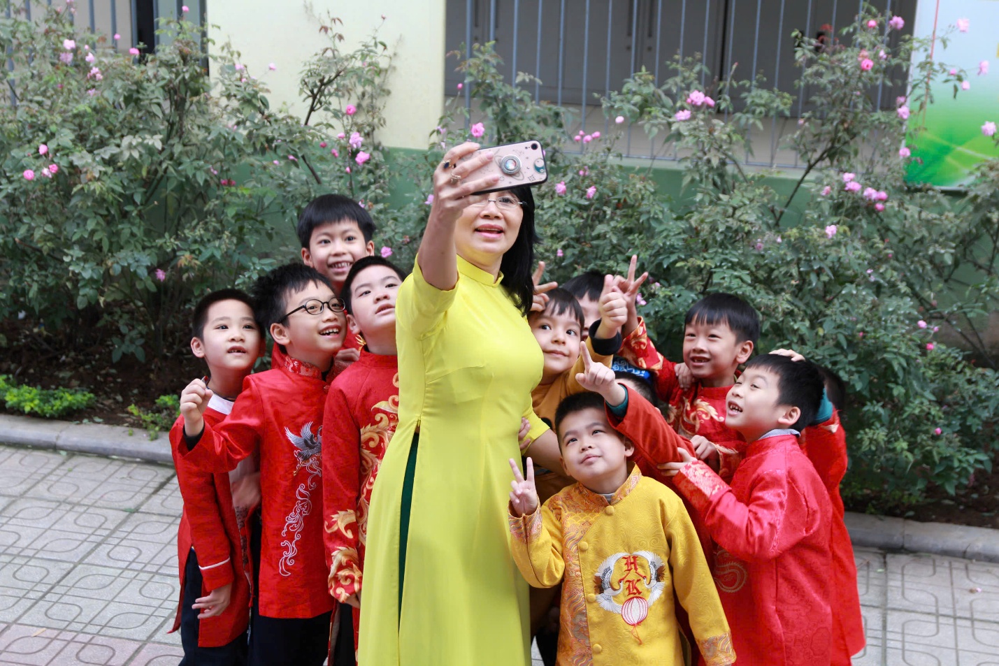 A person taking a selfie with a group of childrenAI-generated content may be incorrect.