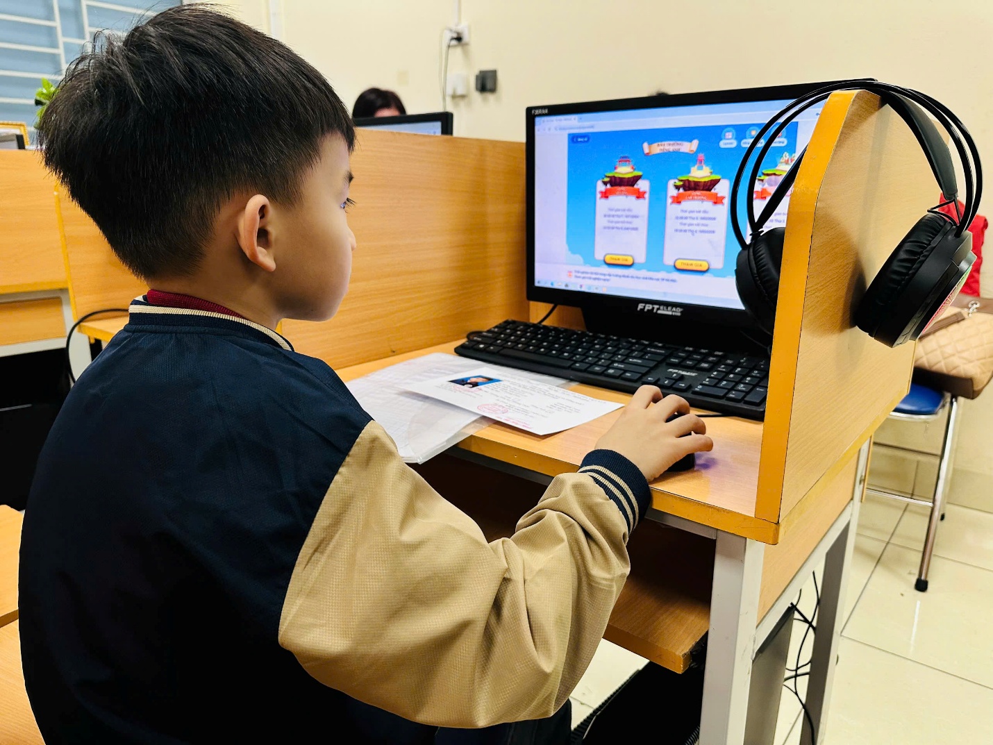 A child using a computerAI-generated content may be incorrect.