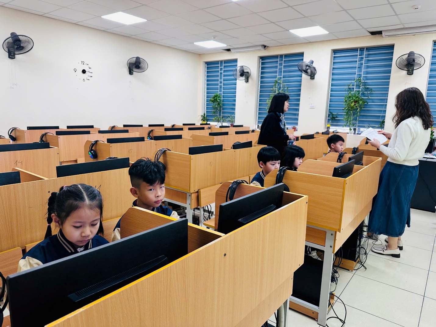 A group of children in a classroomAI-generated content may be incorrect.