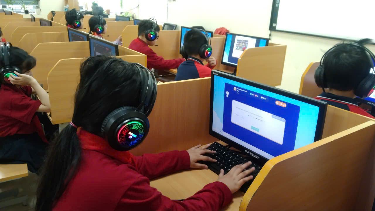 A group of people wearing headphones and using computersAI-generated content may be incorrect.