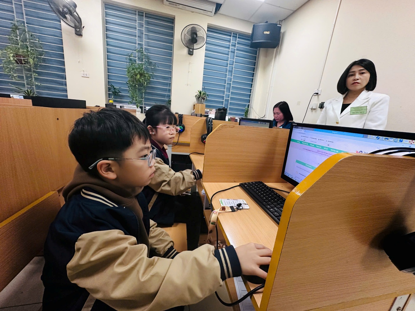 A group of children in a classroomAI-generated content may be incorrect.