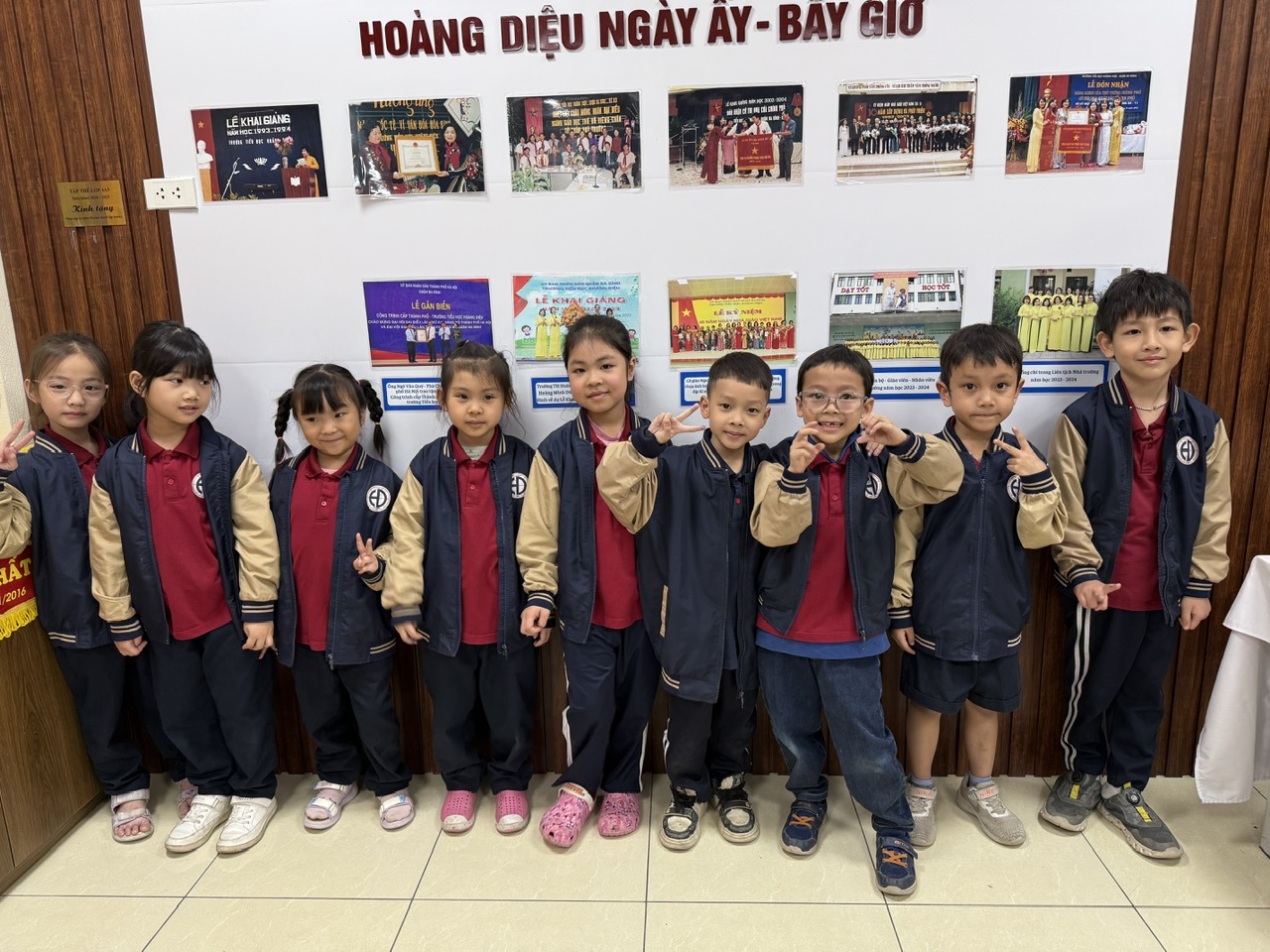 A group of children in school uniformsAI-generated content may be incorrect.