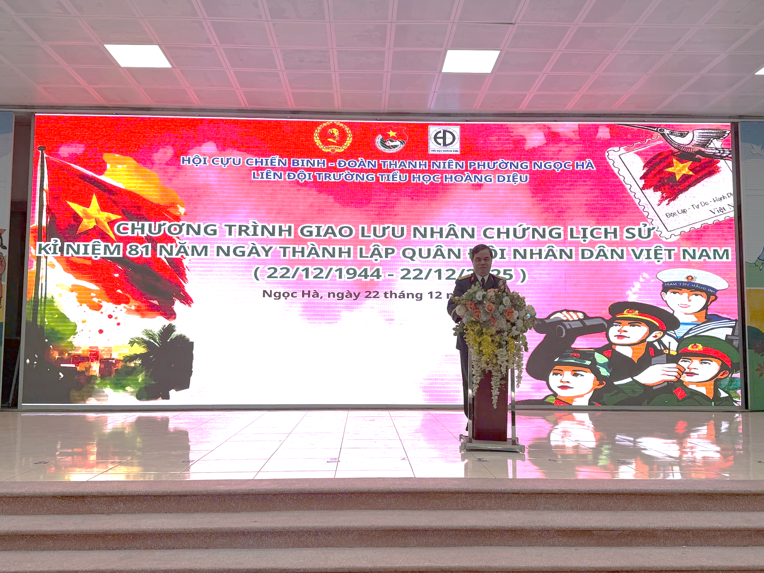 A person standing in front of a large screenAI-generated content may be incorrect.