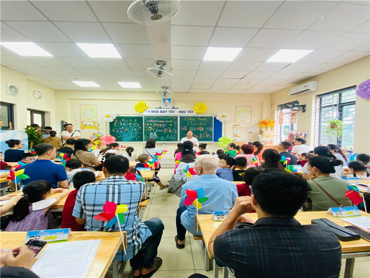 A group of people sitting at desks in a classroomAI-generated content may be incorrect.
