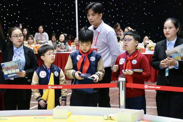 A group of boys standing in front of a red ribbonAI-generated content may be incorrect.
