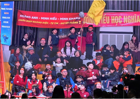 A group of people sitting on a stageAI-generated content may be incorrect.