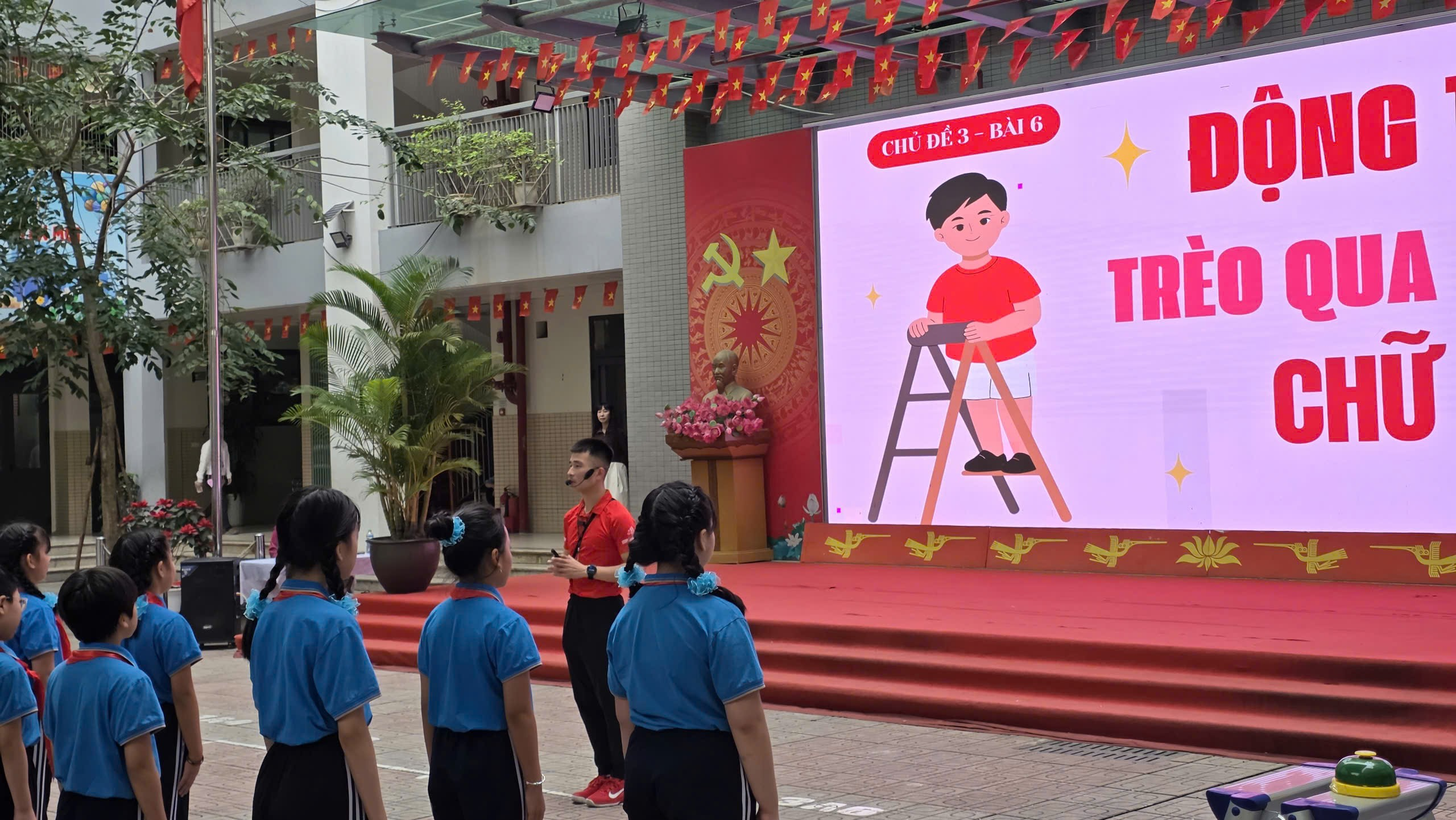 A group of people standing in front of a large screenAI-generated content may be incorrect.